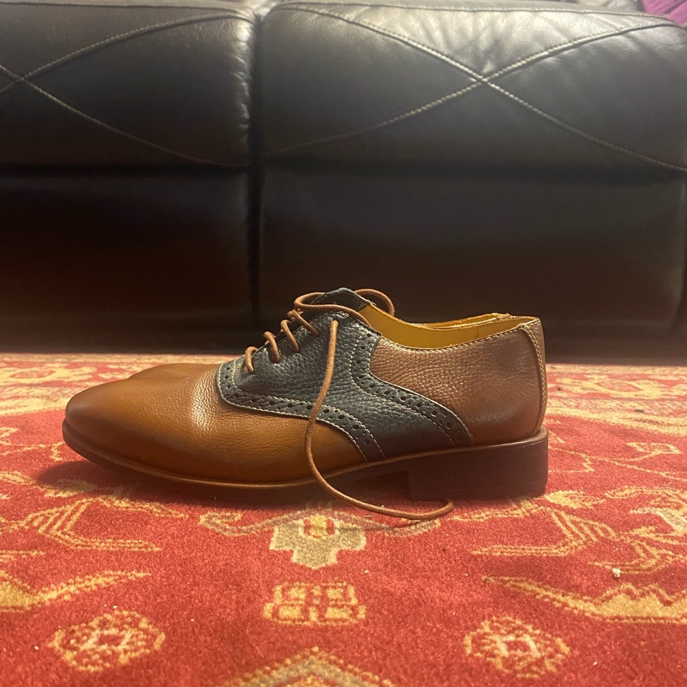 Very Nice brown and dark blue shoes.